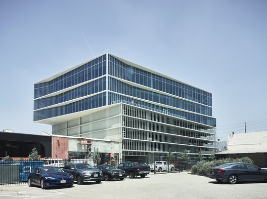 953 N. Sycamore — the glass office building seen from the street